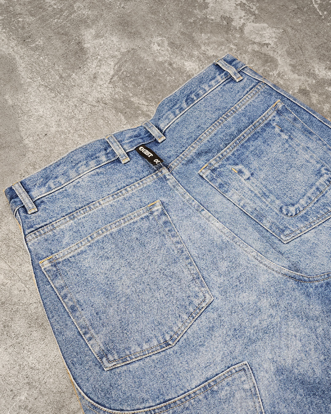 THE SHORT WORK CHAPS IN LIGHT FADED INDIGO DENIM