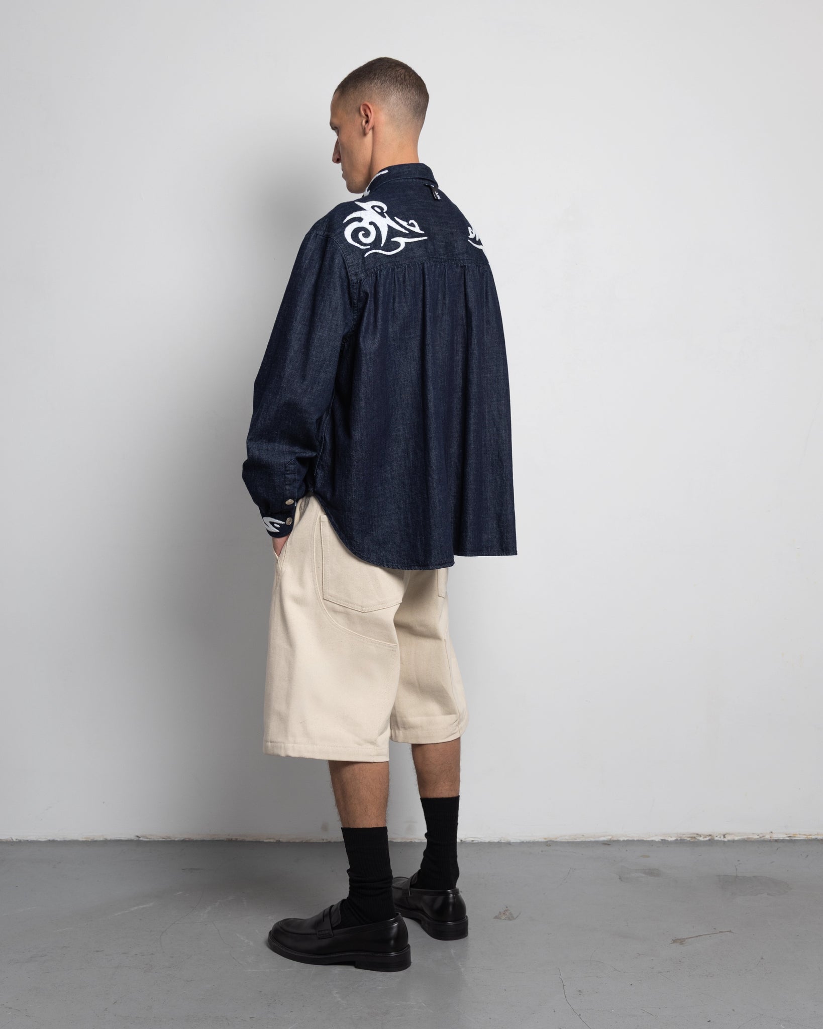 THE SHORT WORK CHAPS IN OFF-WHITE DENIM