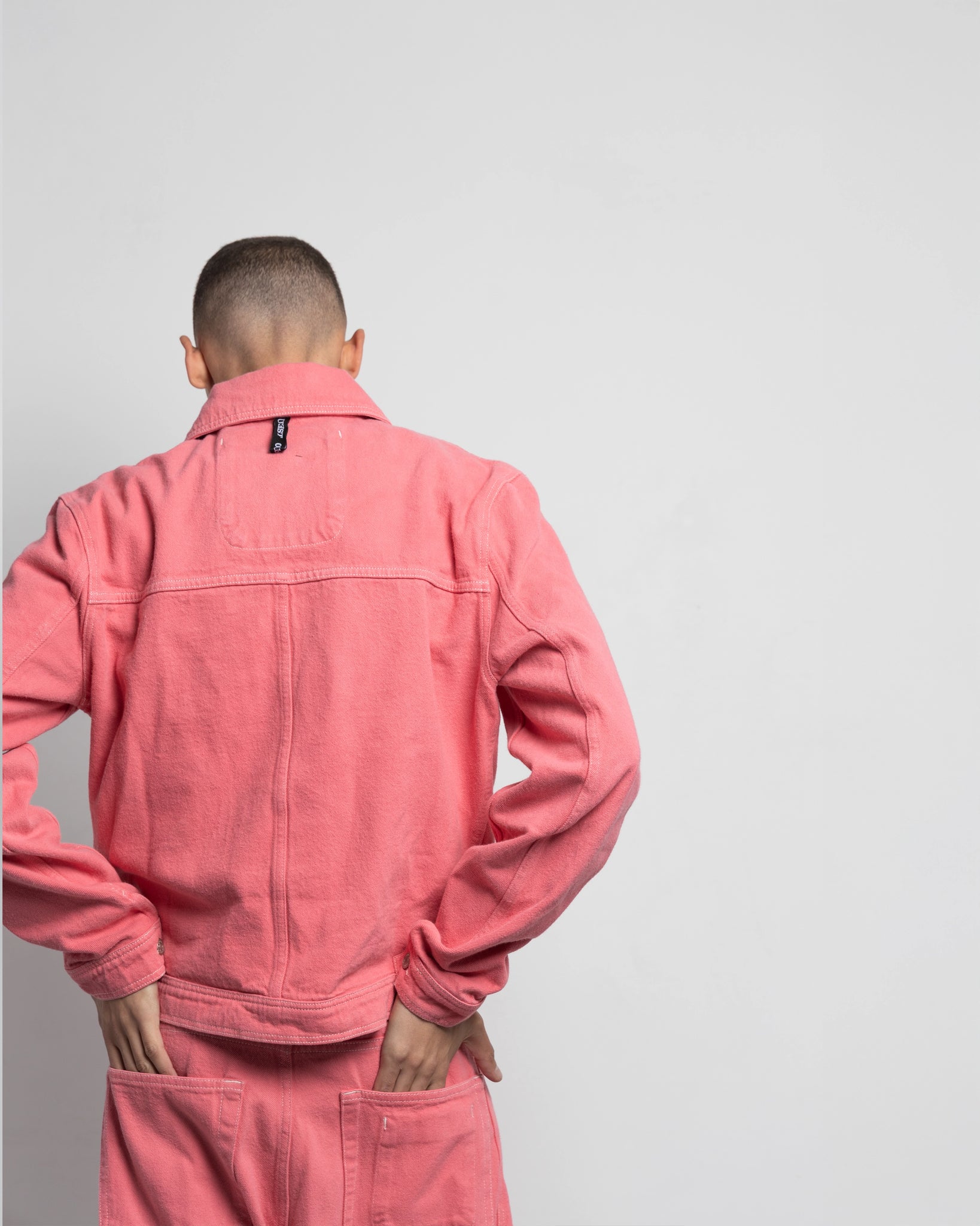 THE TRUCKER JACKET IN PINK DENIM