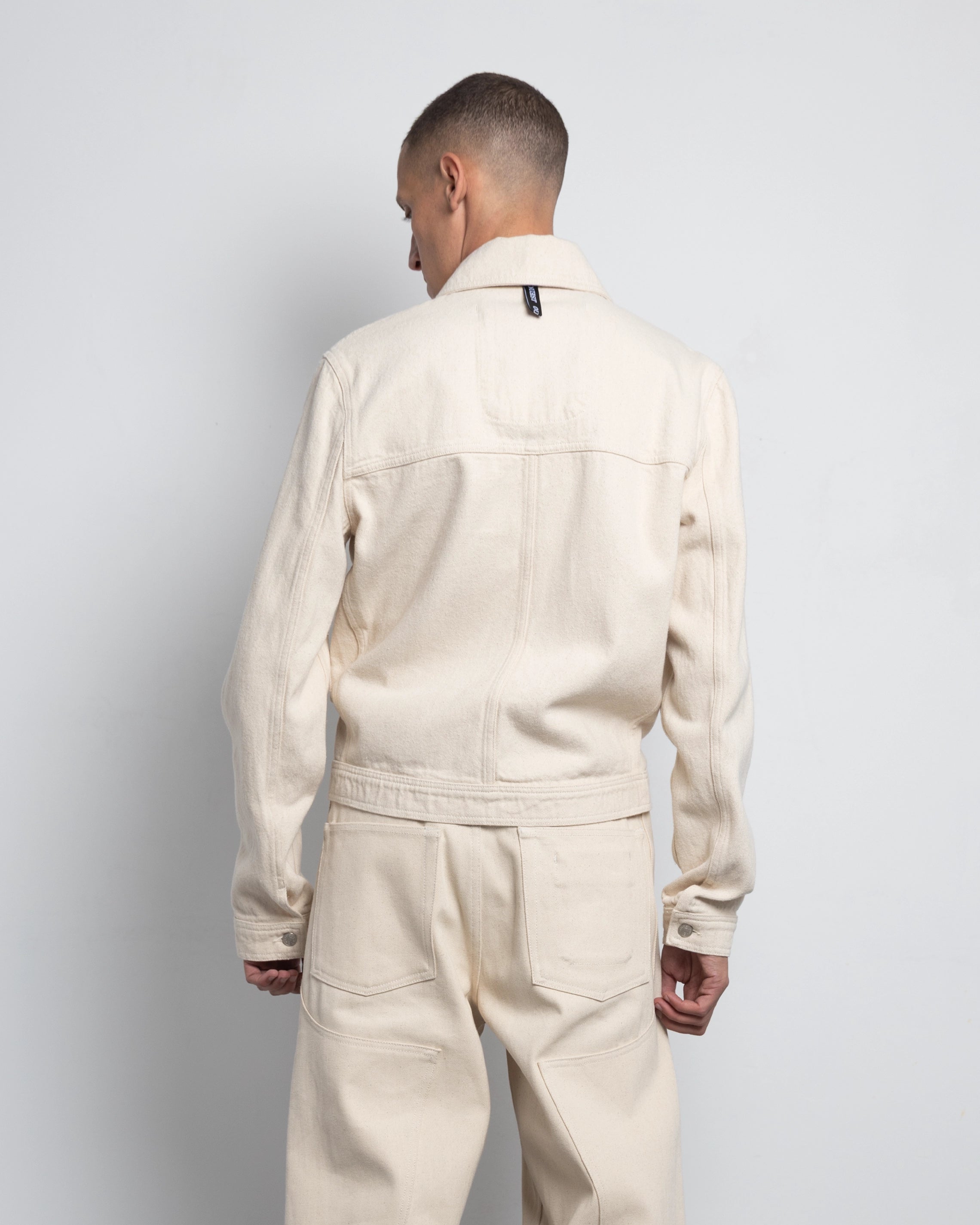 THE TRUCKER JACKET IN OFF-WHITE DENIM