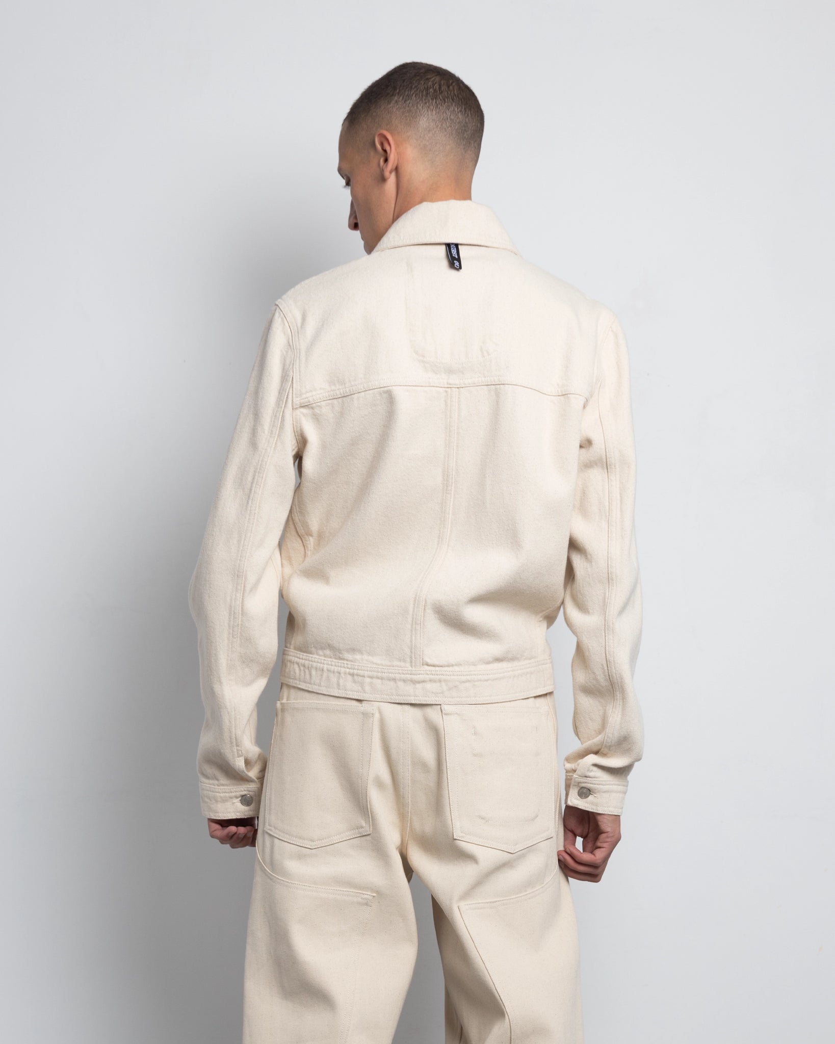 THE TRUCKER JACKET IN OFF-WHITE DENIM