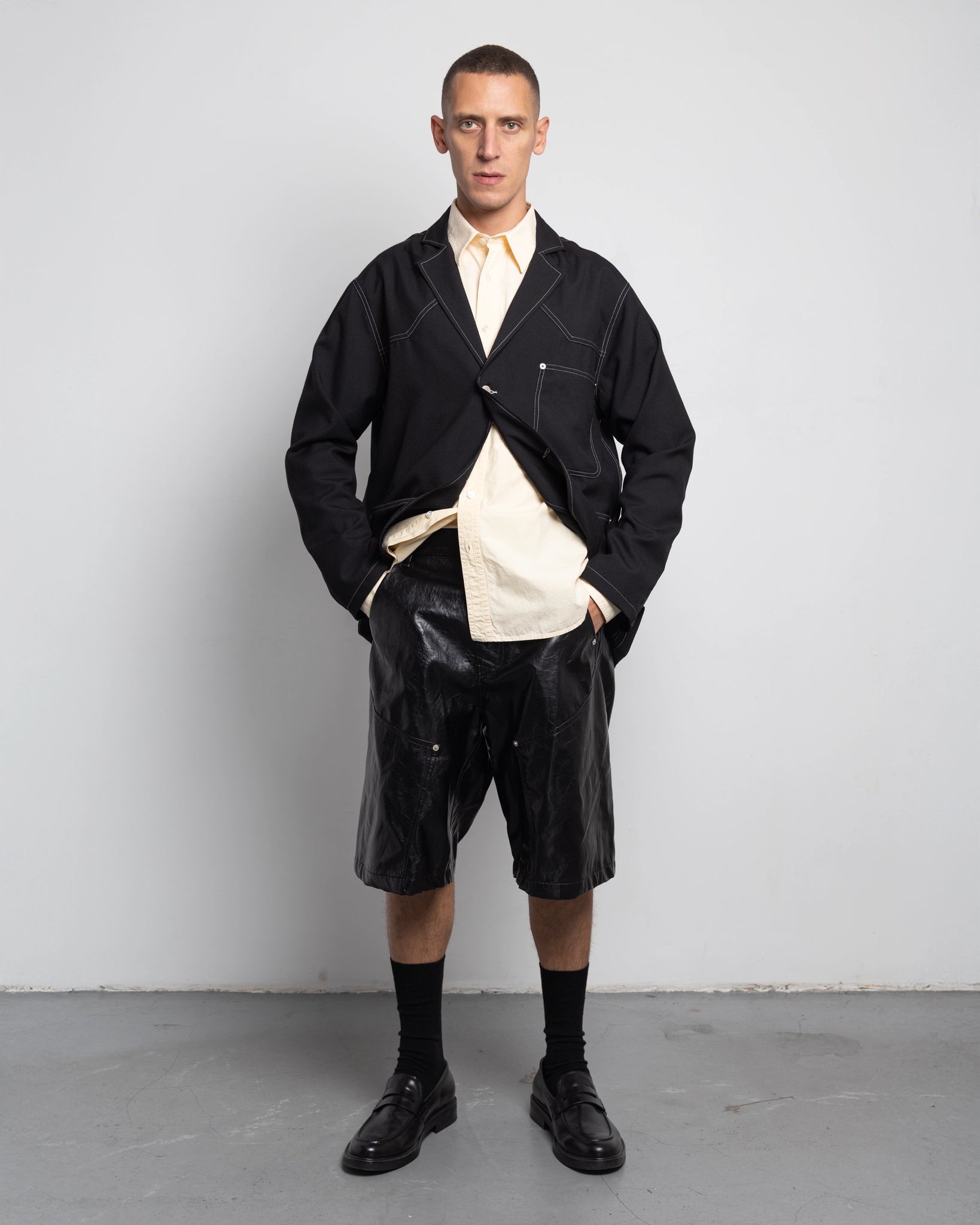 THE UNLINED JACKET IN BLACK WOOL CANVAS