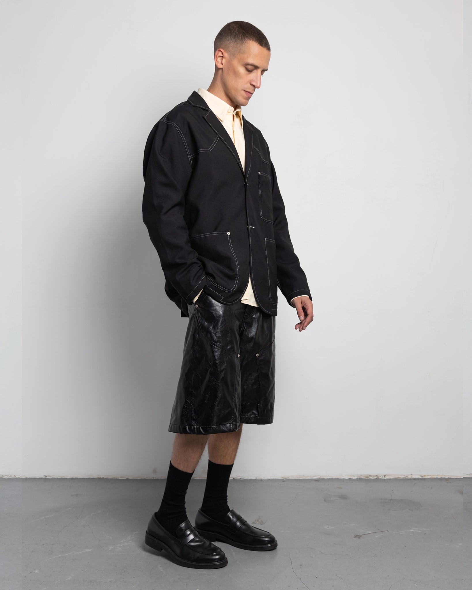 THE UNLINED JACKET IN BLACK WOOL CANVAS