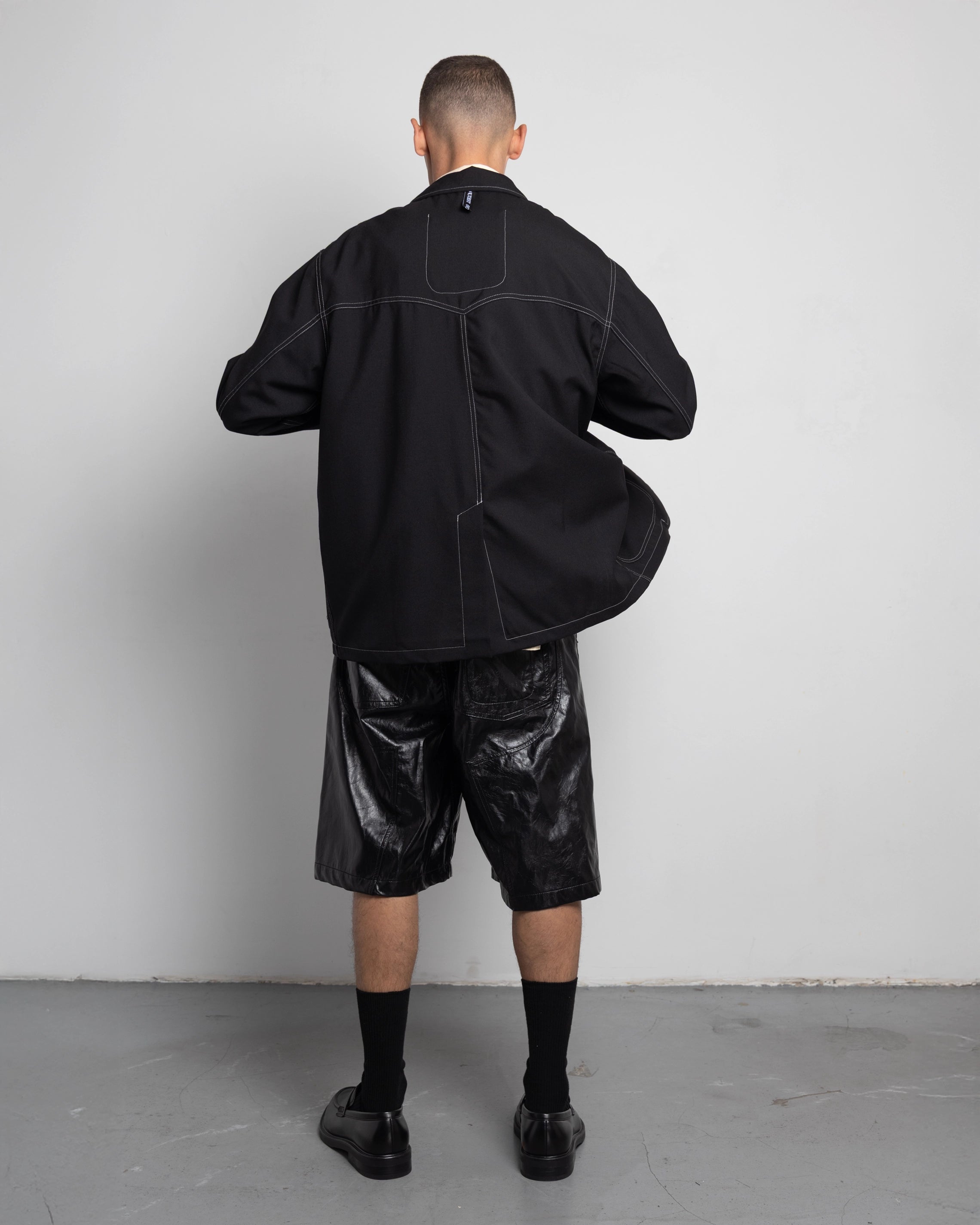 THE UNLINED JACKET IN BLACK WOOL CANVAS