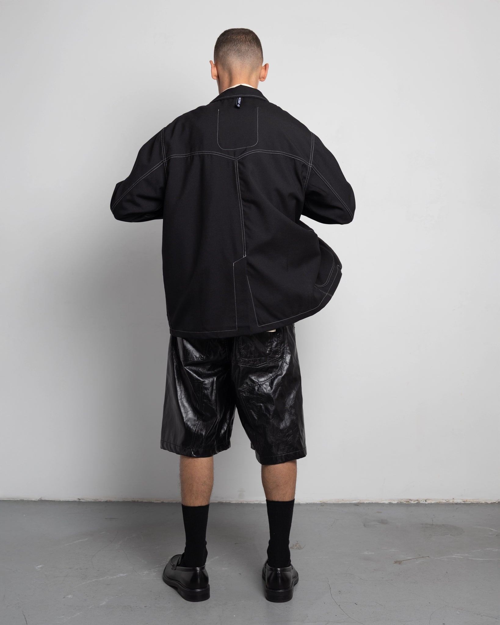THE UNLINED JACKET IN BLACK WOOL CANVAS