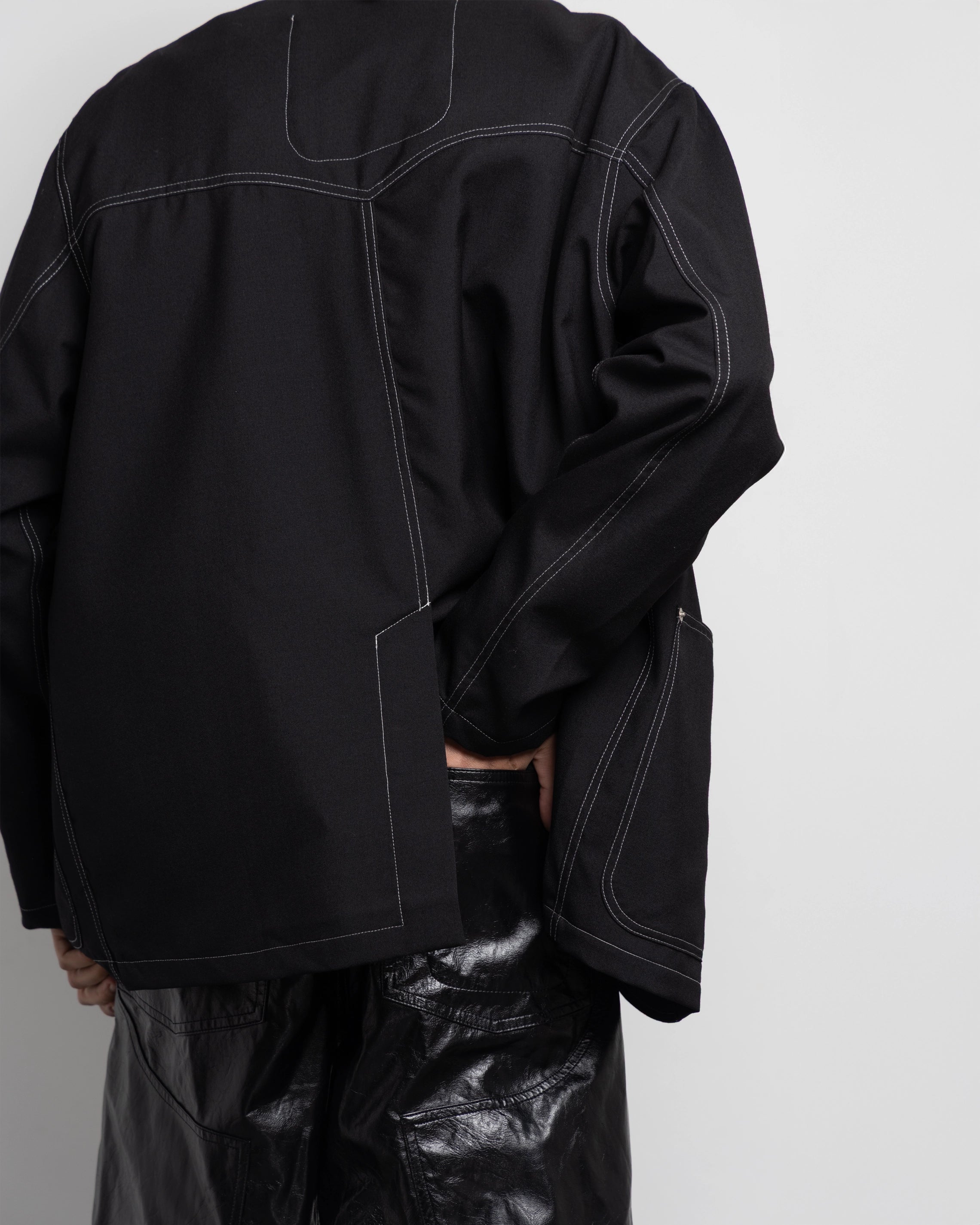 THE UNLINED JACKET IN BLACK WOOL CANVAS