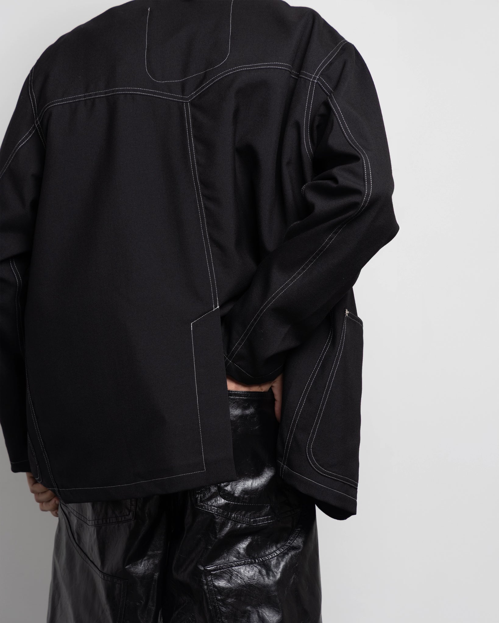 THE UNLINED JACKET IN BLACK WOOL CANVAS