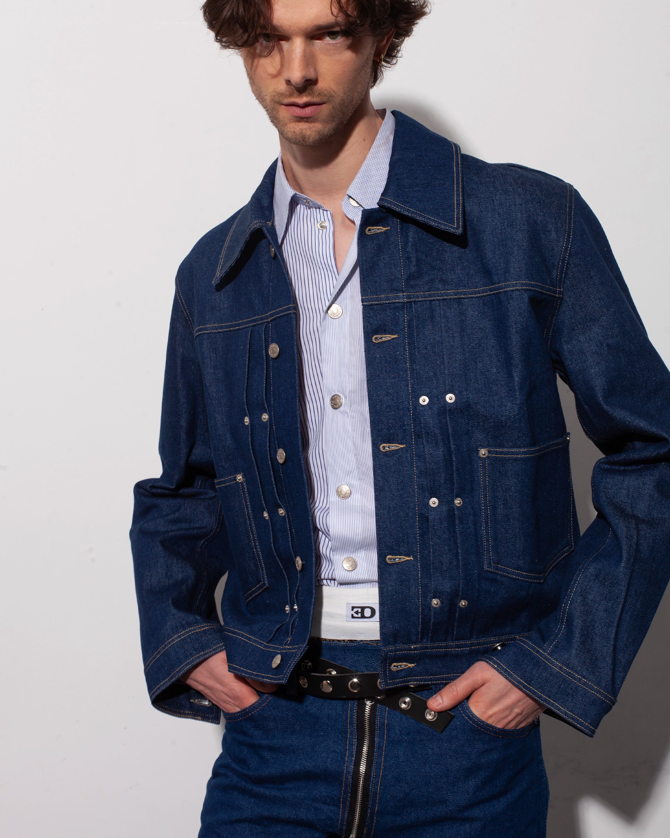 THE DENIM TRUCKER JACKET IN RECYCLED INDIGO DENIM