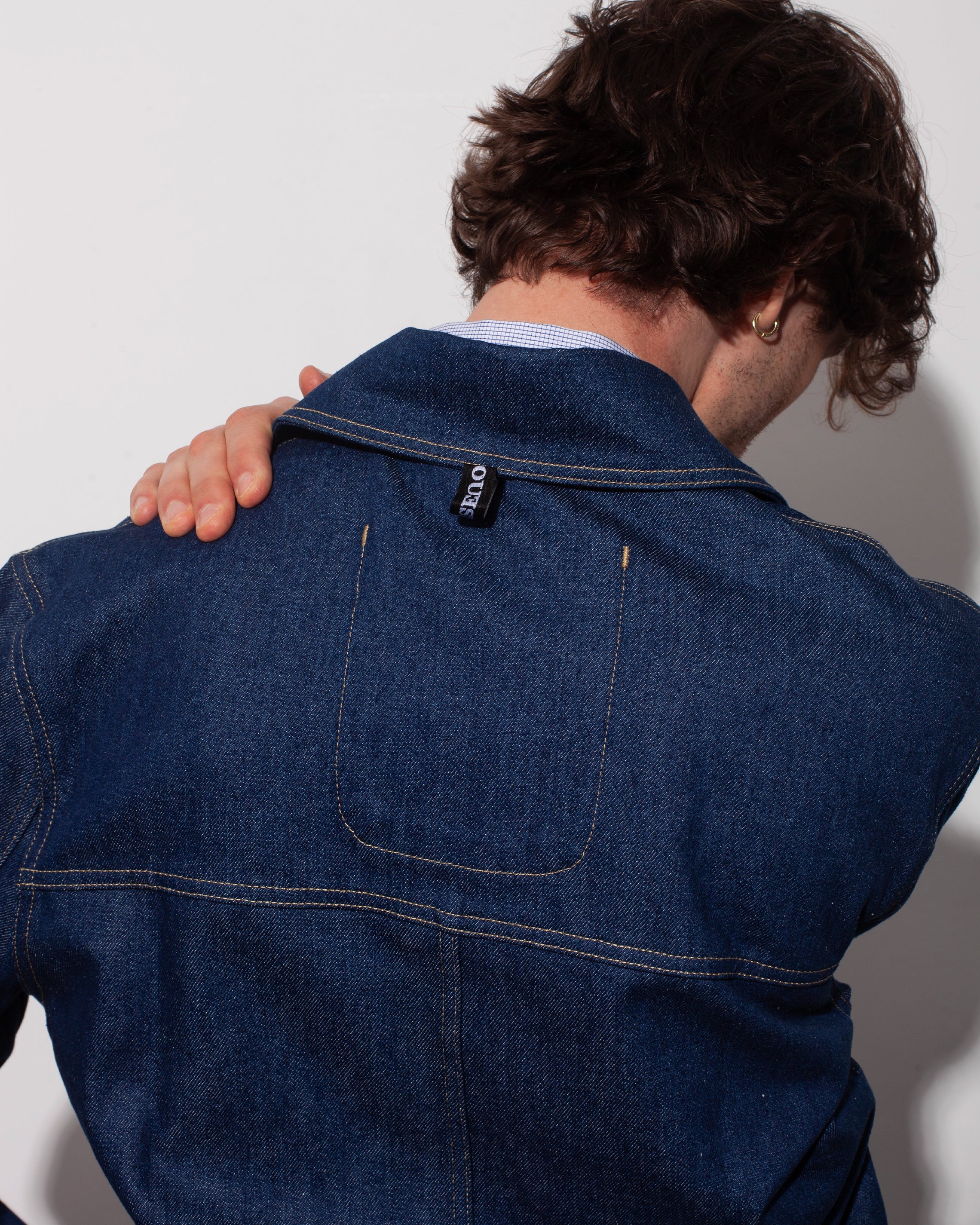 THE DENIM TRUCKER JACKET IN RECYCLED INDIGO DENIM