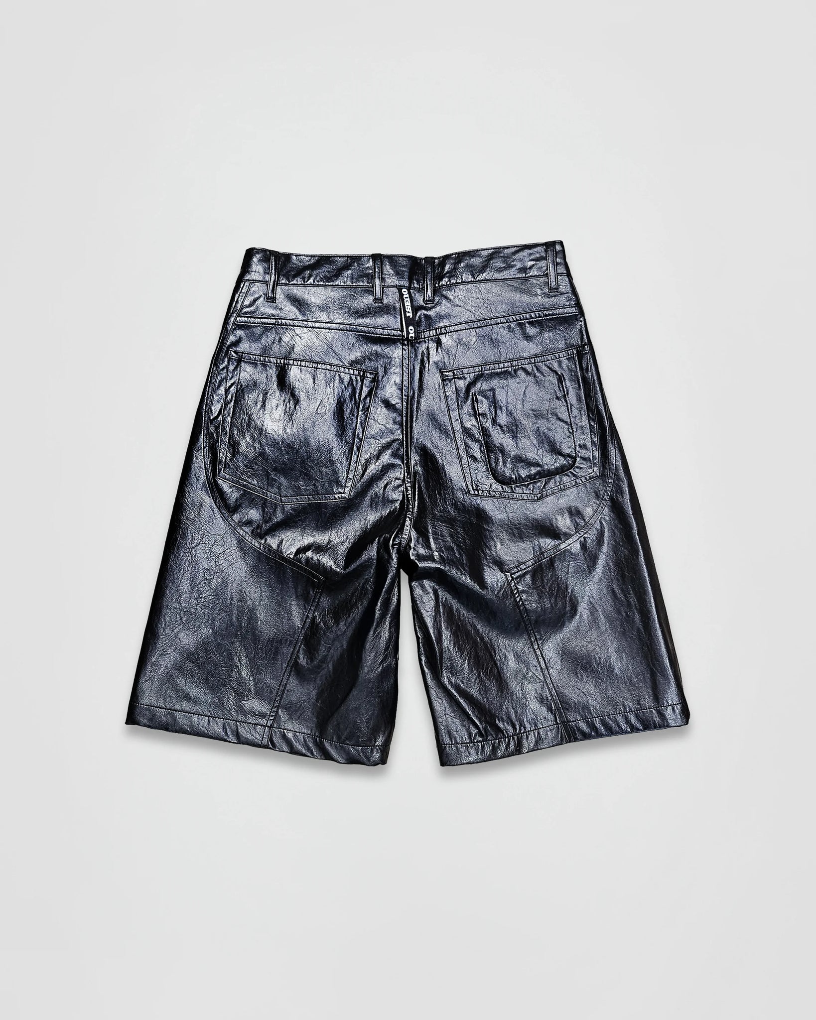 THE SHORT WORK CHAPS IN BLACK FAUX LEATHER