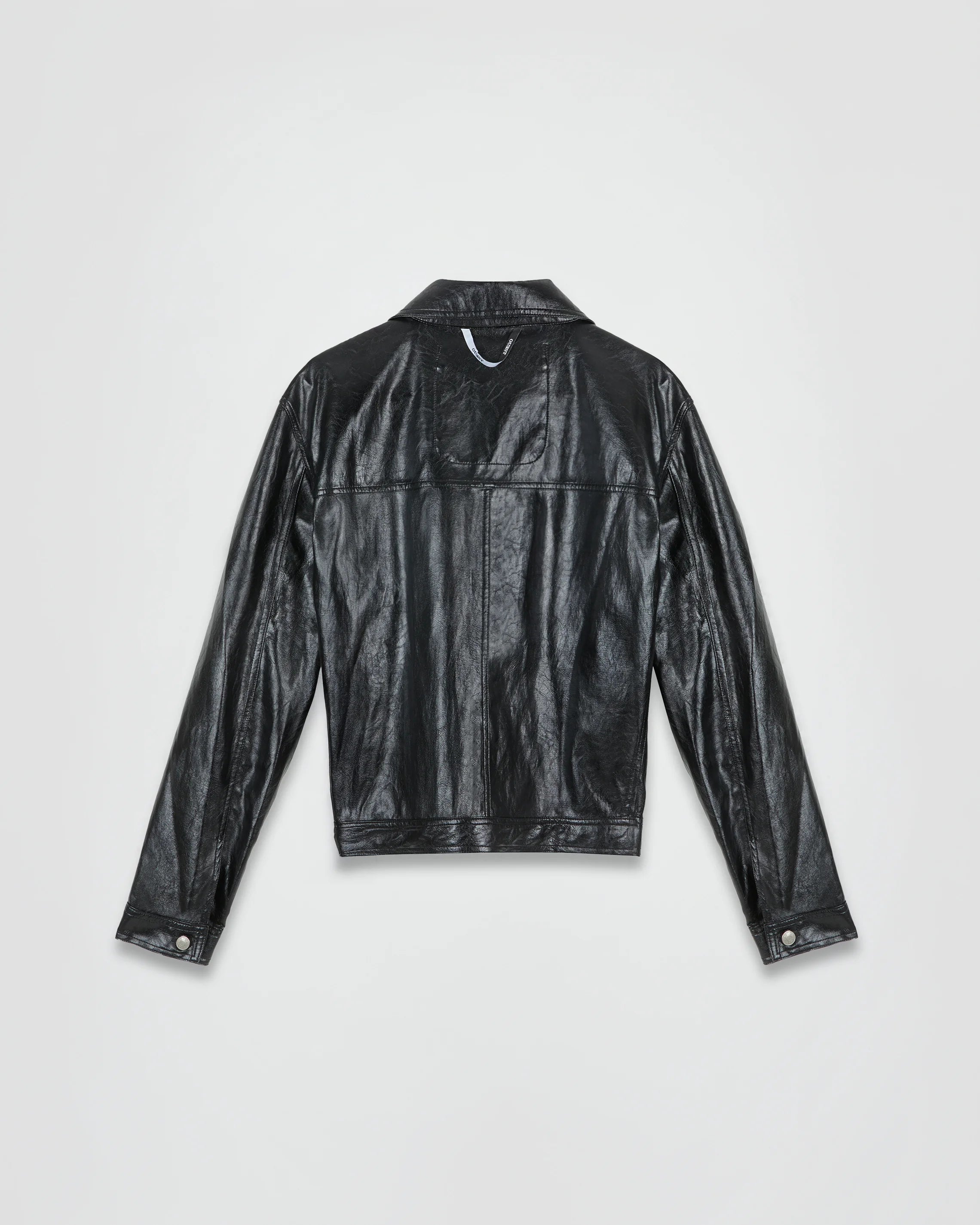 THE TRUCKER JACKET IN BLACK FAUX LEATHER