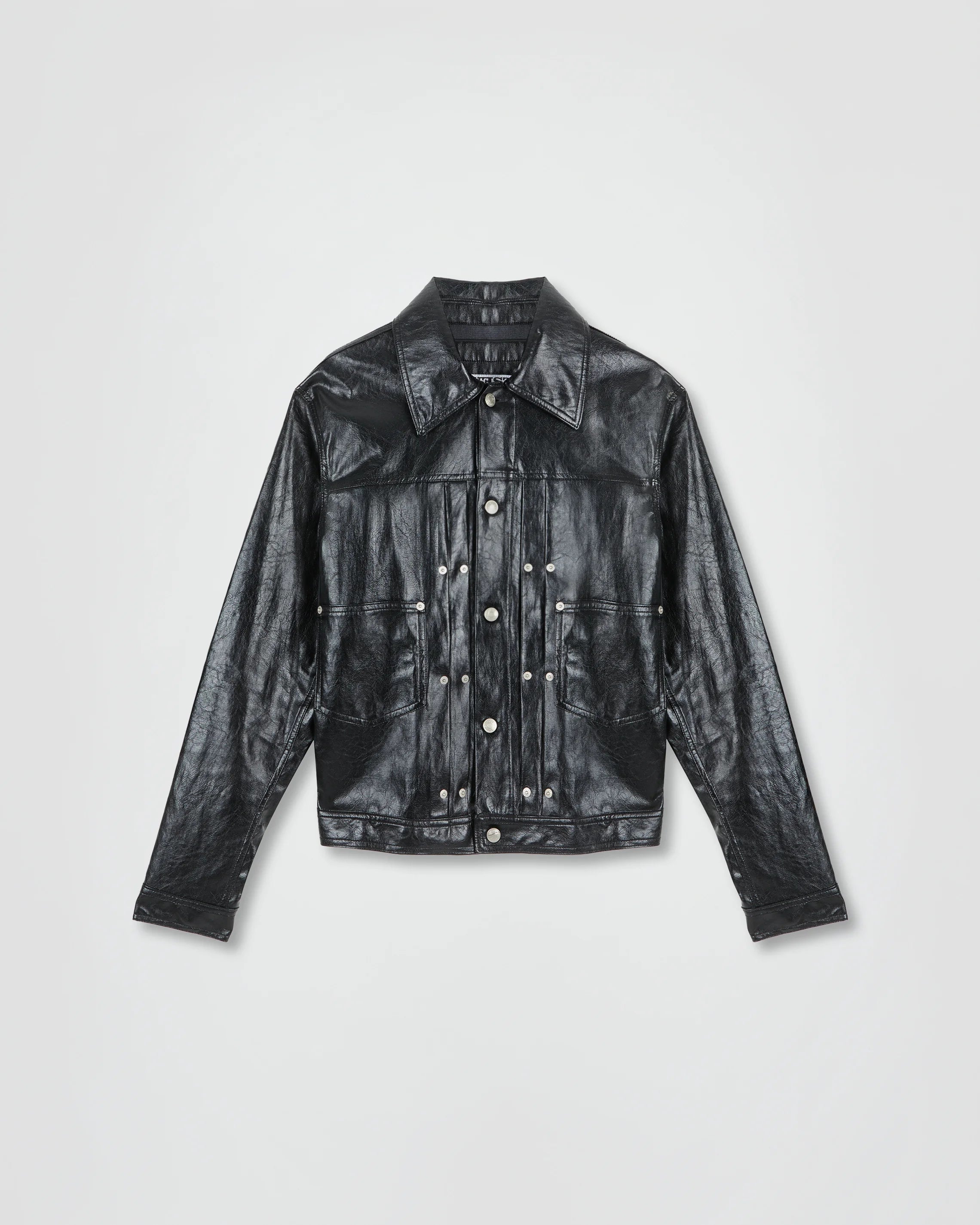 THE TRUCKER JACKET IN BLACK FAUX LEATHER