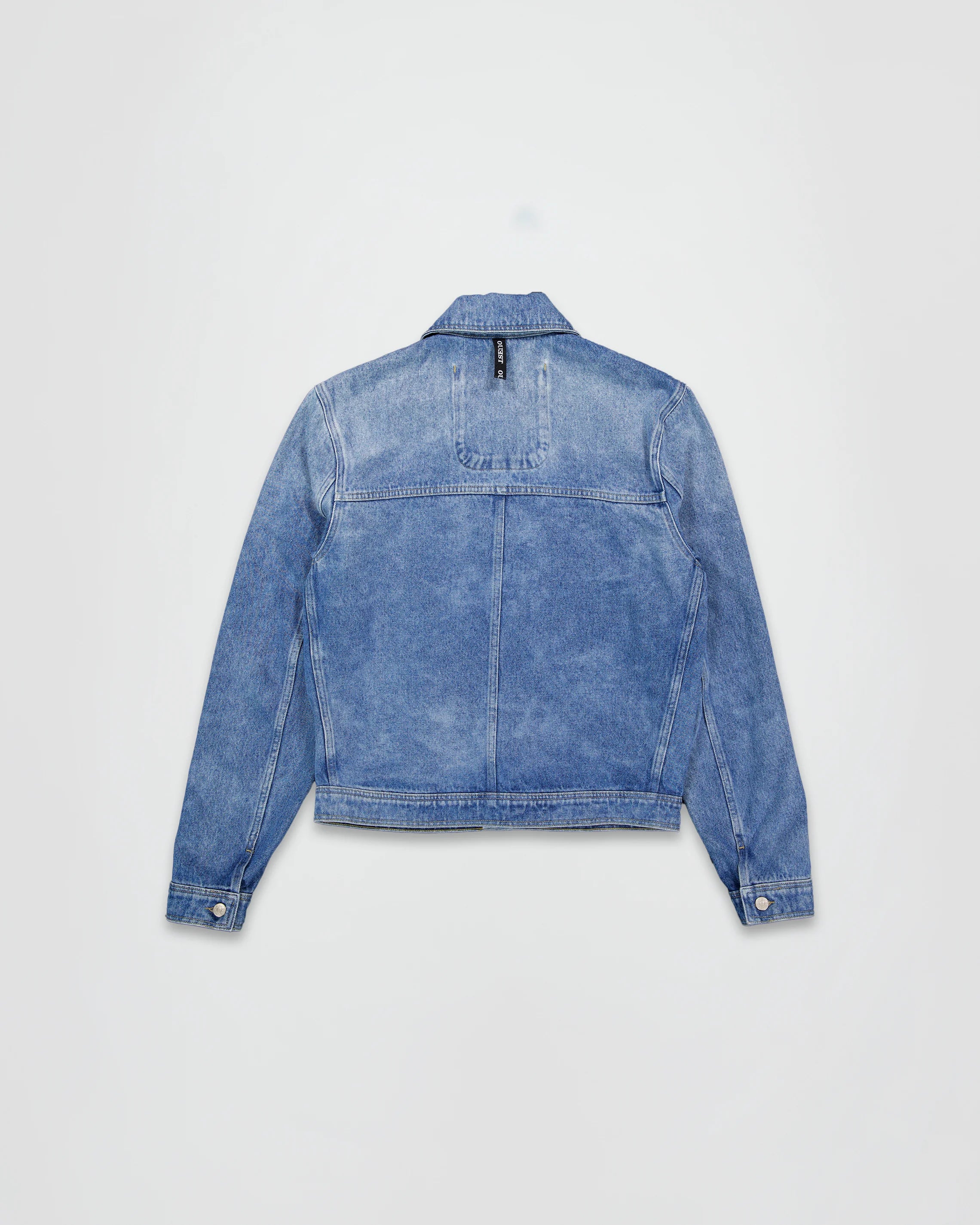 THE TRUCKER JACKET IN LIGHT FADED INDIGO DENIM