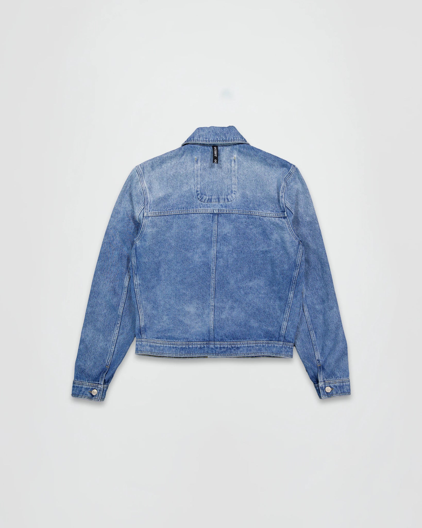 THE TRUCKER JACKET IN LIGHT FADED INDIGO DENIM