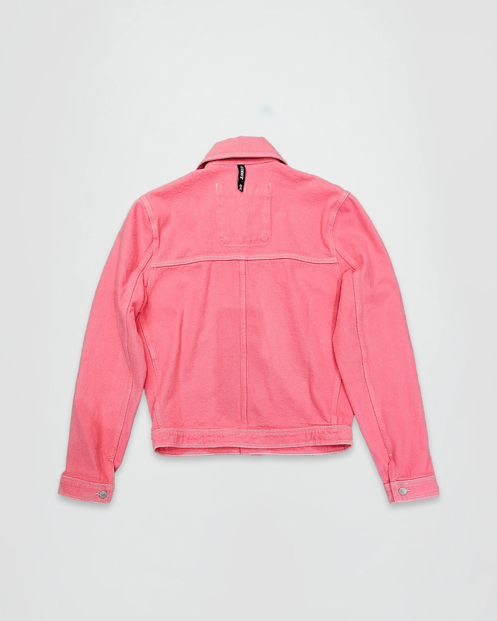 THE TRUCKER JACKET IN PINK DENIM