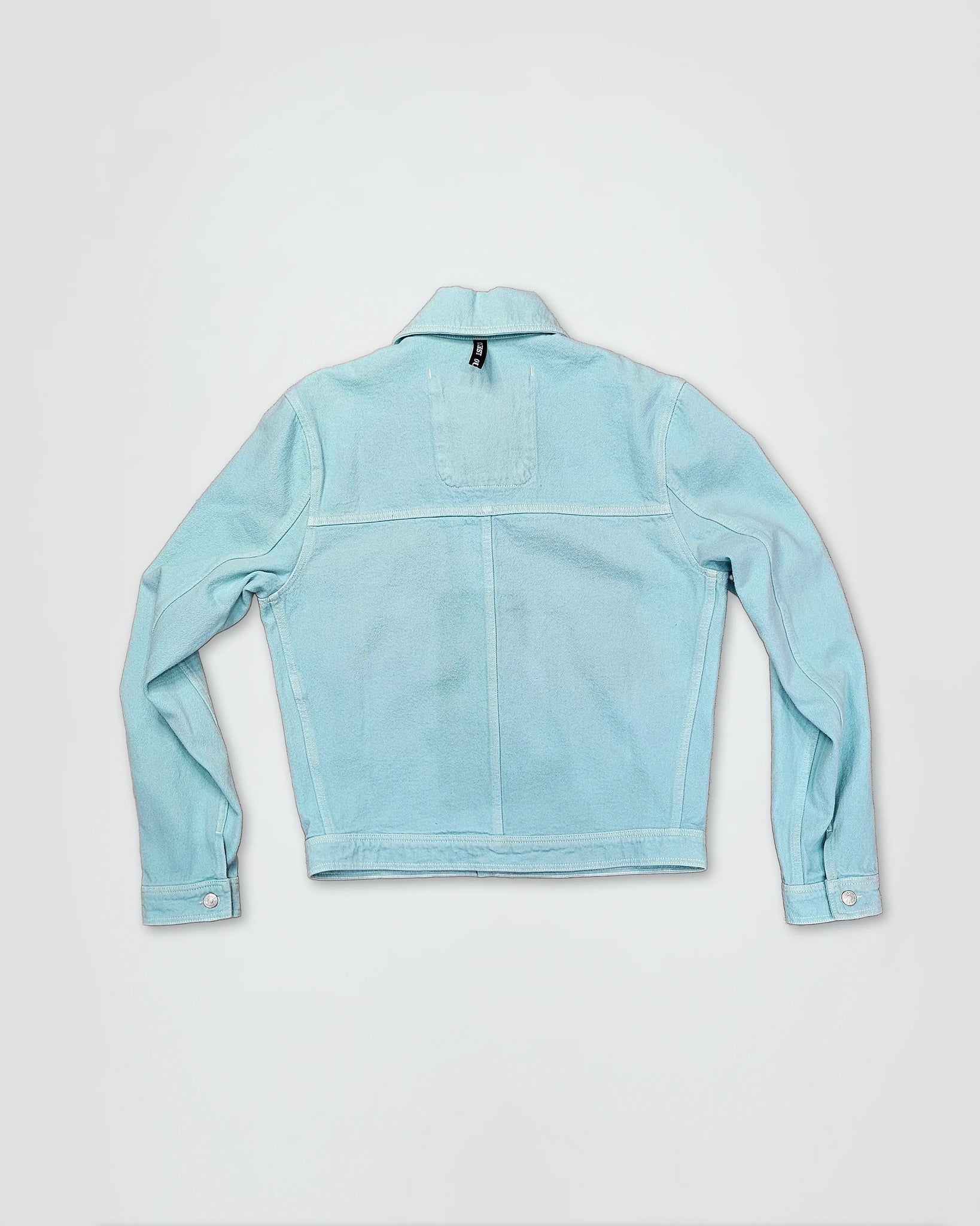 THE TRUCKER JACKET IN TURQUOISE DENIM