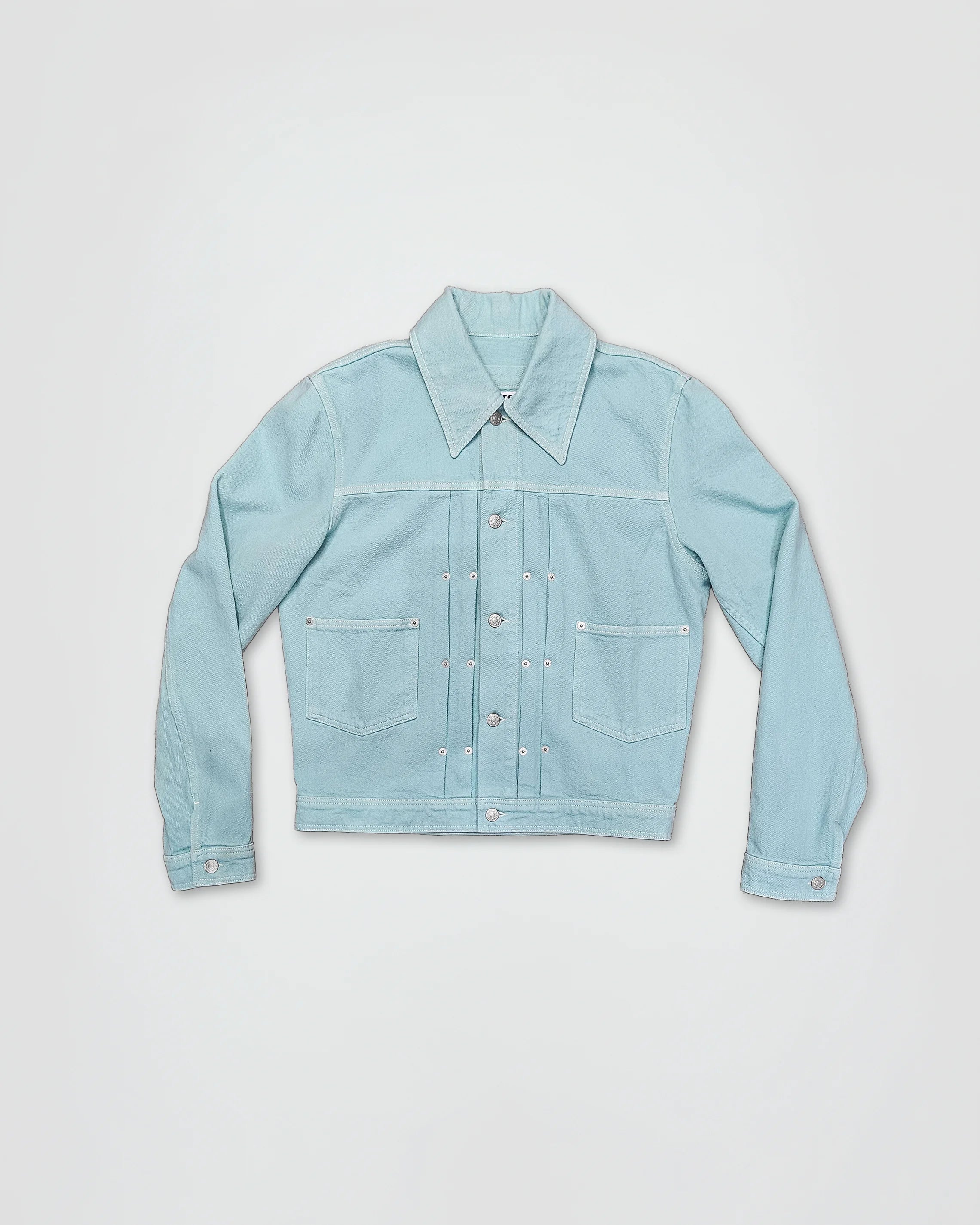 THE TRUCKER JACKET IN TURQUOISE DENIM