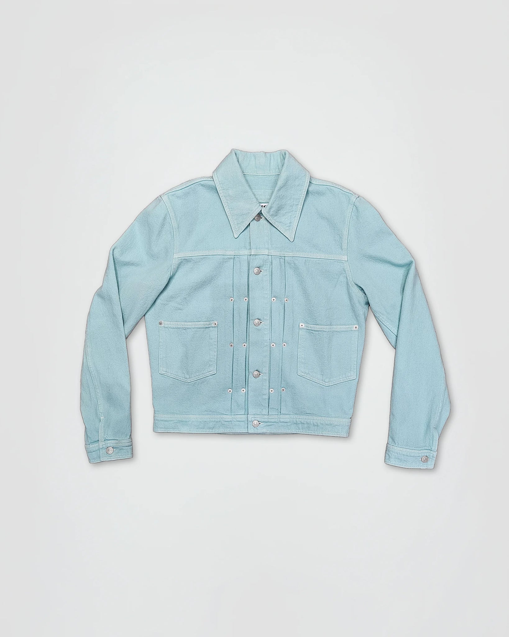 THE TRUCKER JACKET IN TURQUOISE DENIM
