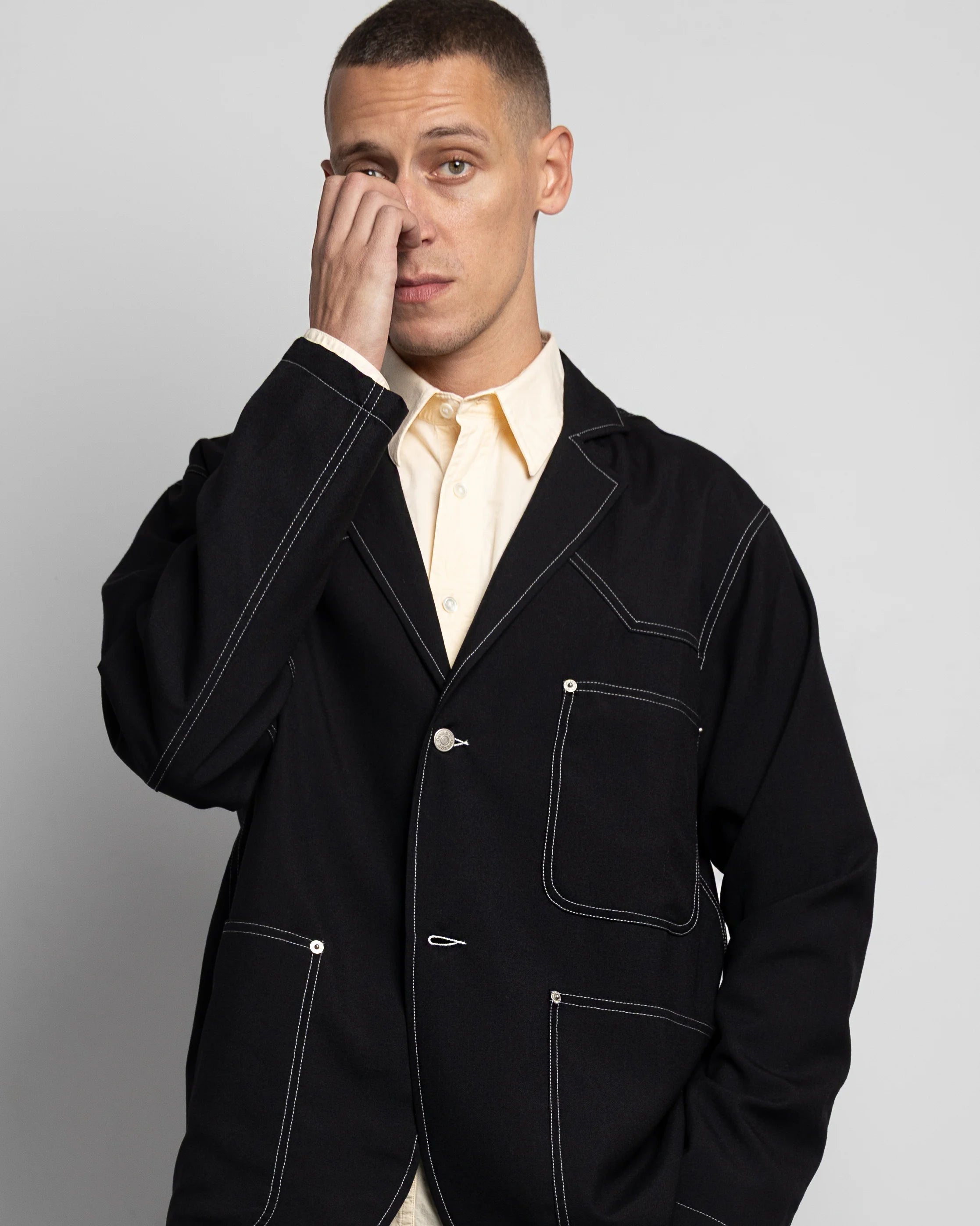 THE UNLINED JACKET IN BLACK WOOL CANVAS