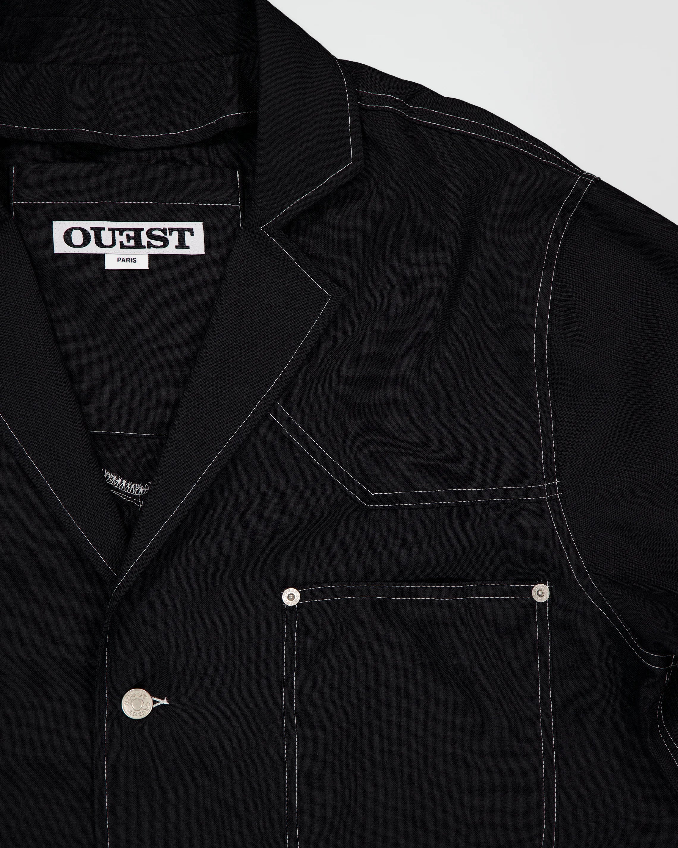 THE UNLINED JACKET IN BLACK WOOL CANVAS
