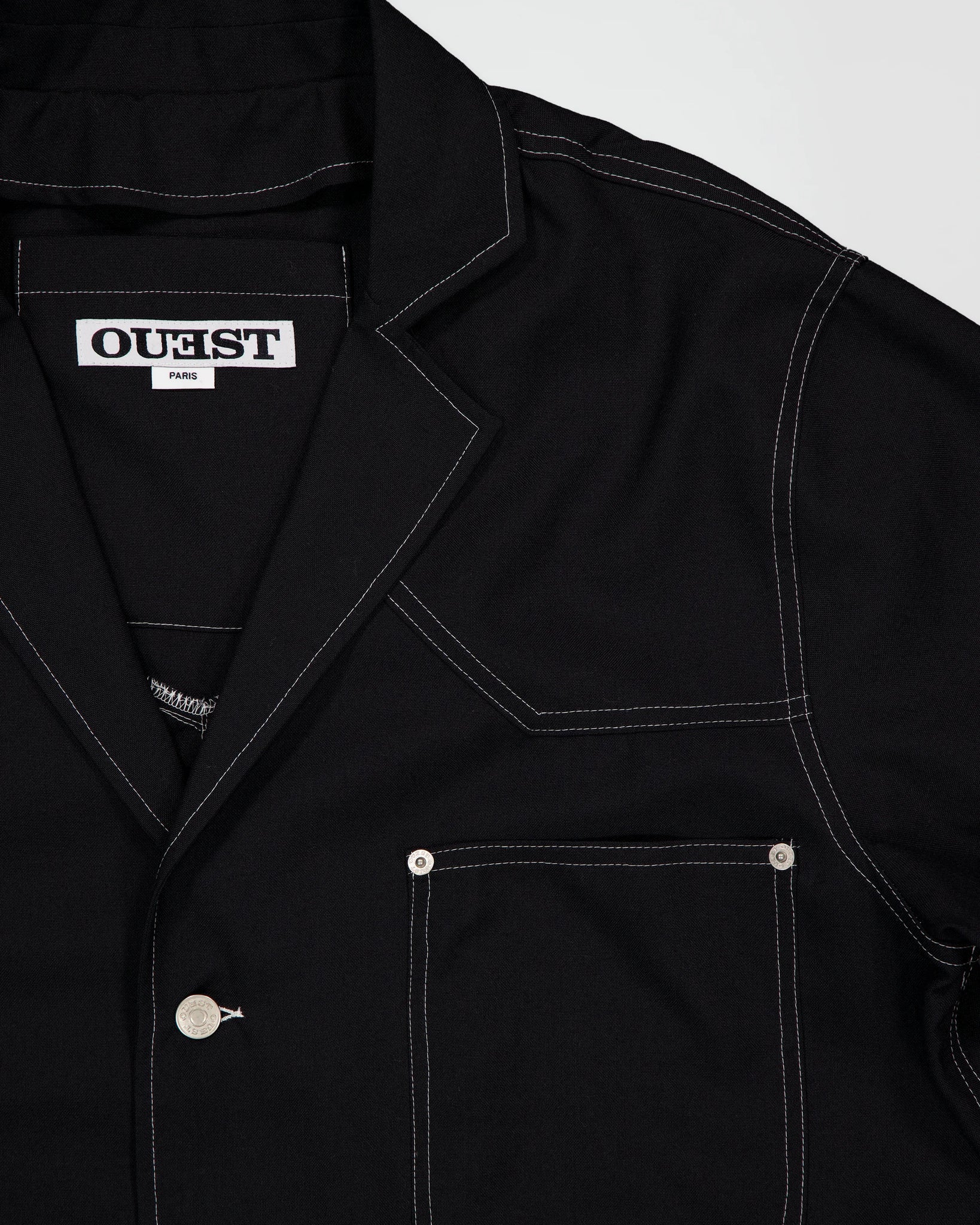 THE UNLINED JACKET IN BLACK WOOL CANVAS