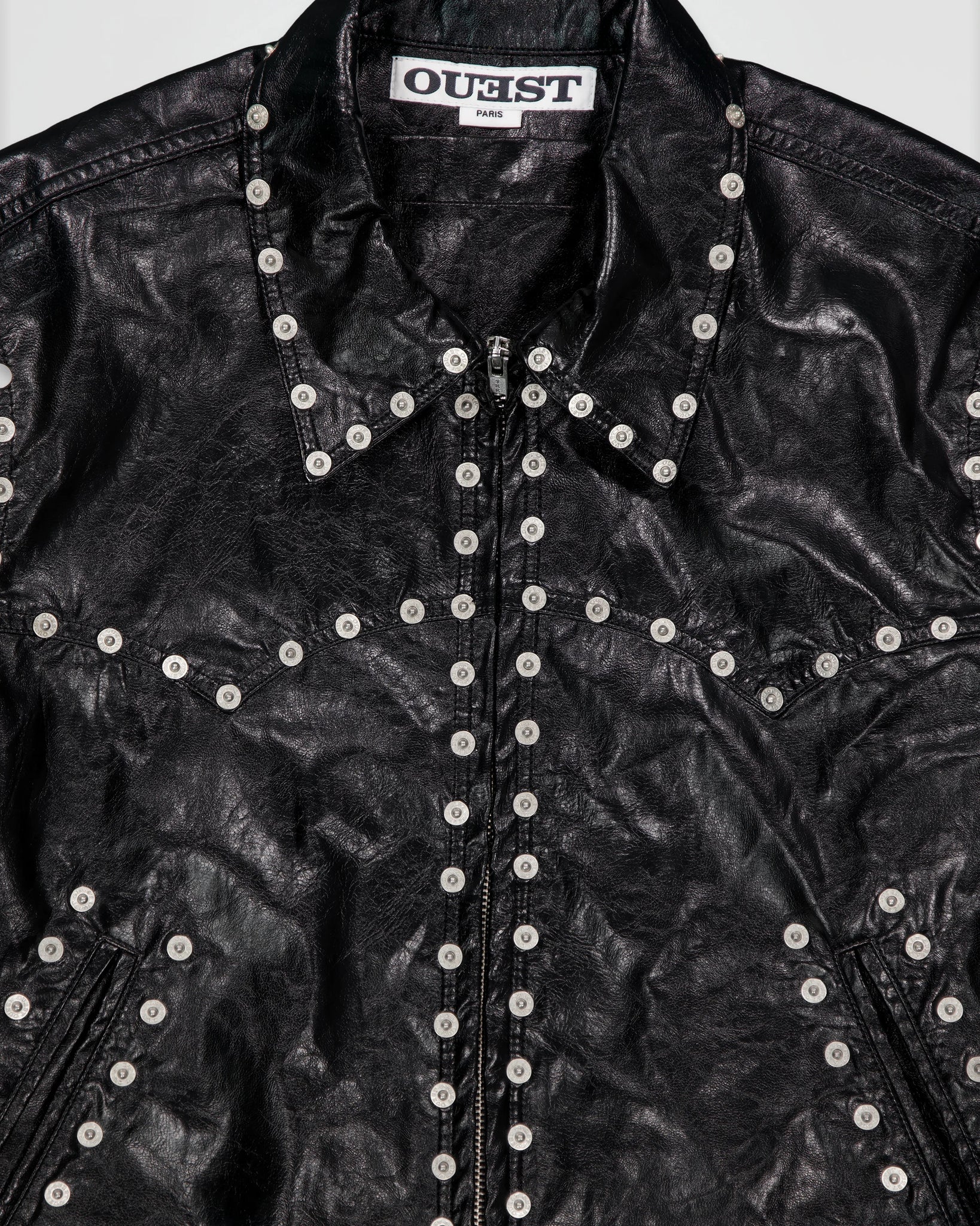 THE ZIPPED STUDDED JACKET IN BLACK FAUX LEATHER