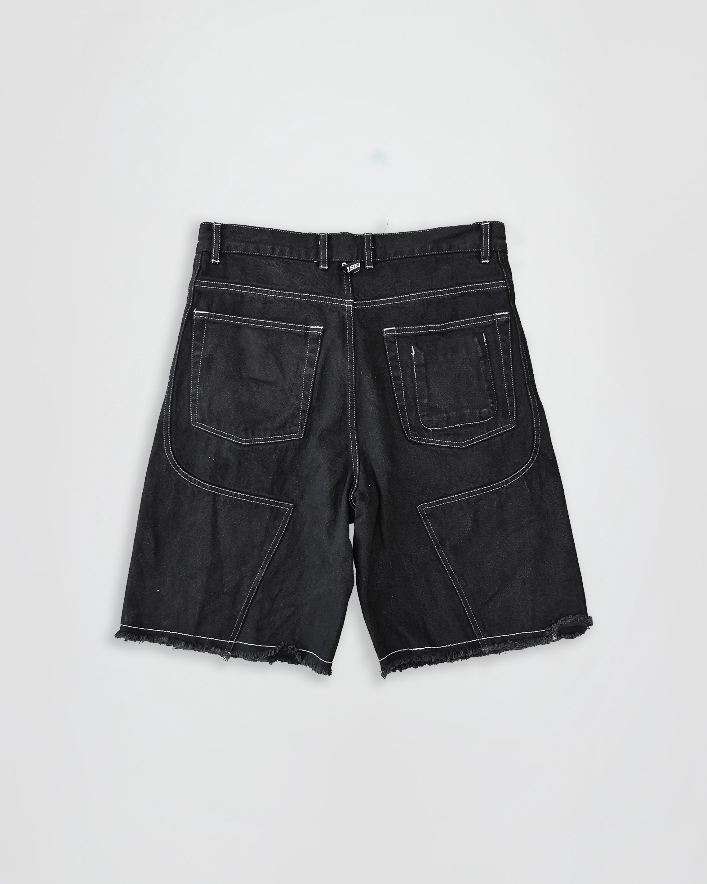 THE CUTOFF SHORT CHAPS IN BLACK DENIM