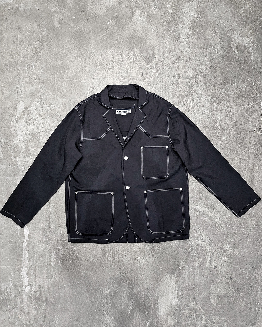 THE UNLINED JACKET IN BLACK WOOL CANVAS