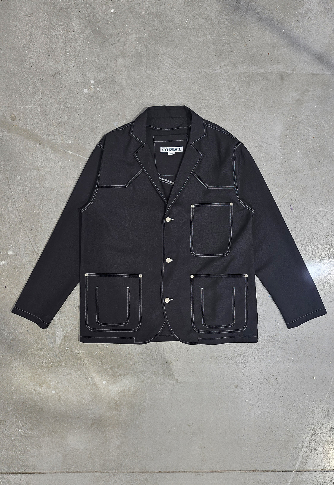 THE UNLINED JACKET IN BLACK WOOL CANVAS