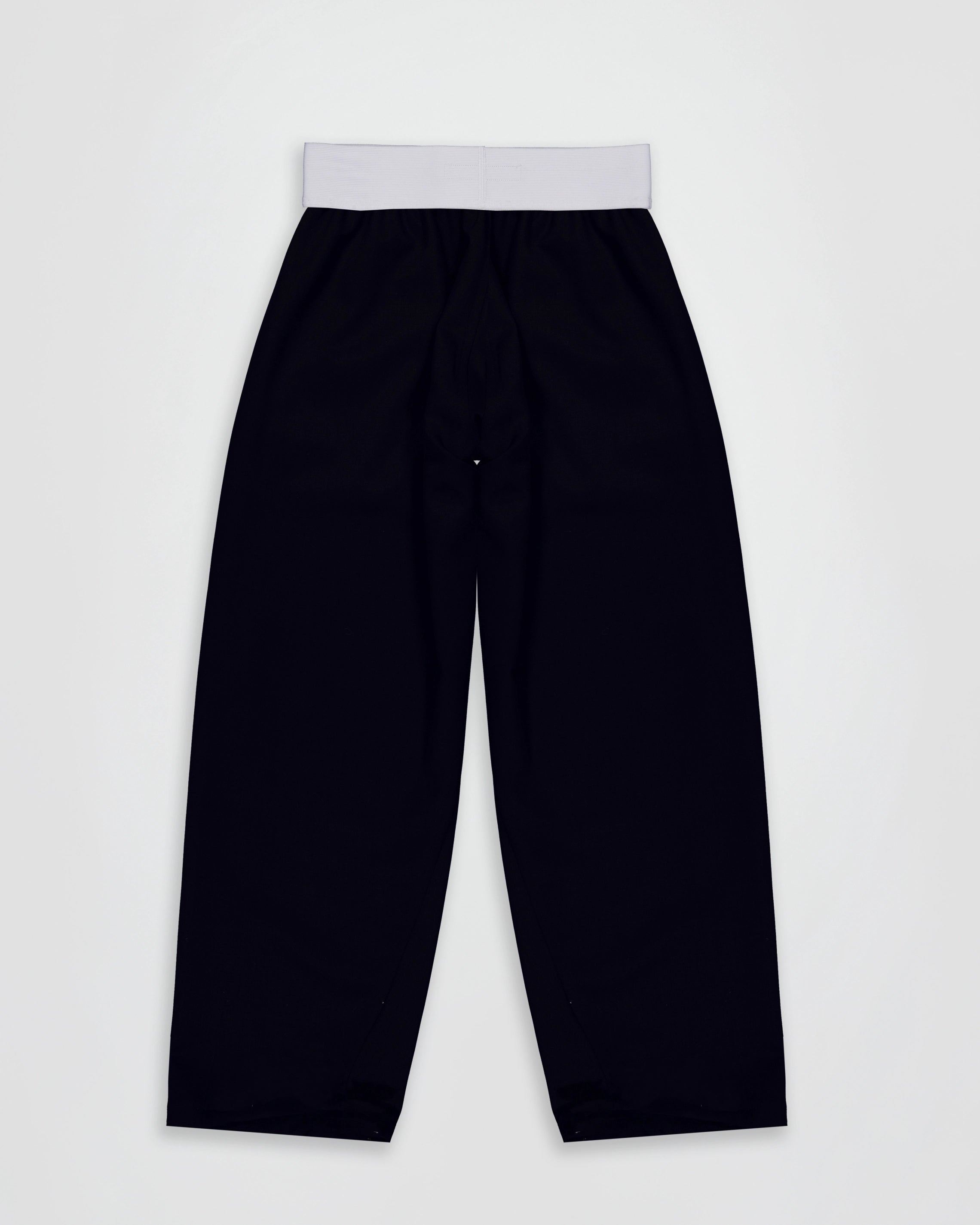 THE BRIEF TROUSERS IN BLACK WOOL