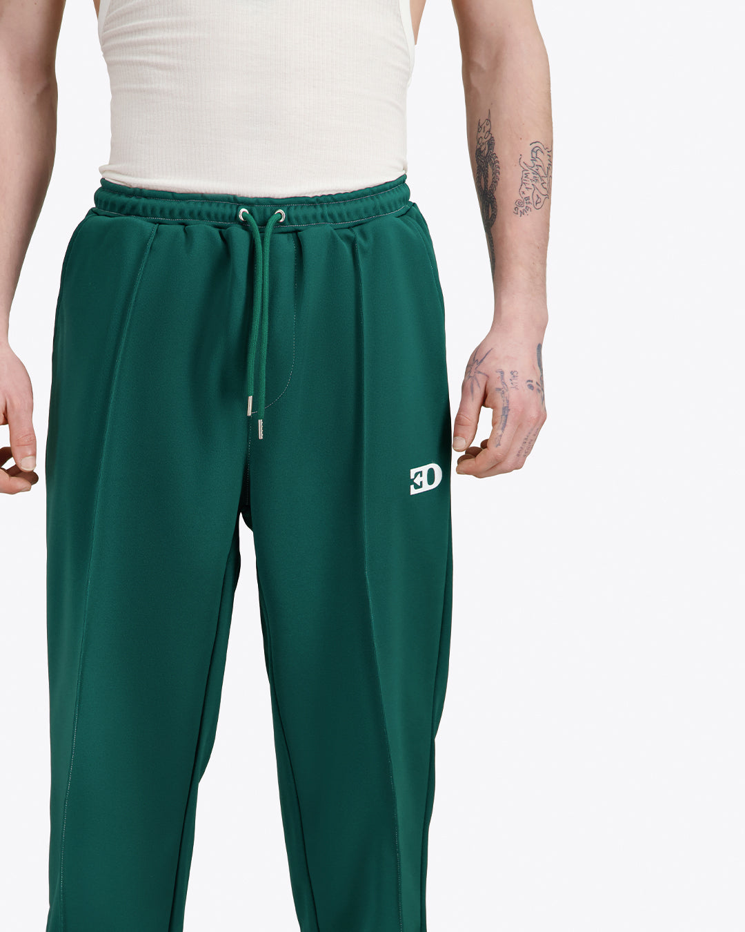 THE 70S TRACK PANTS IN GREEN