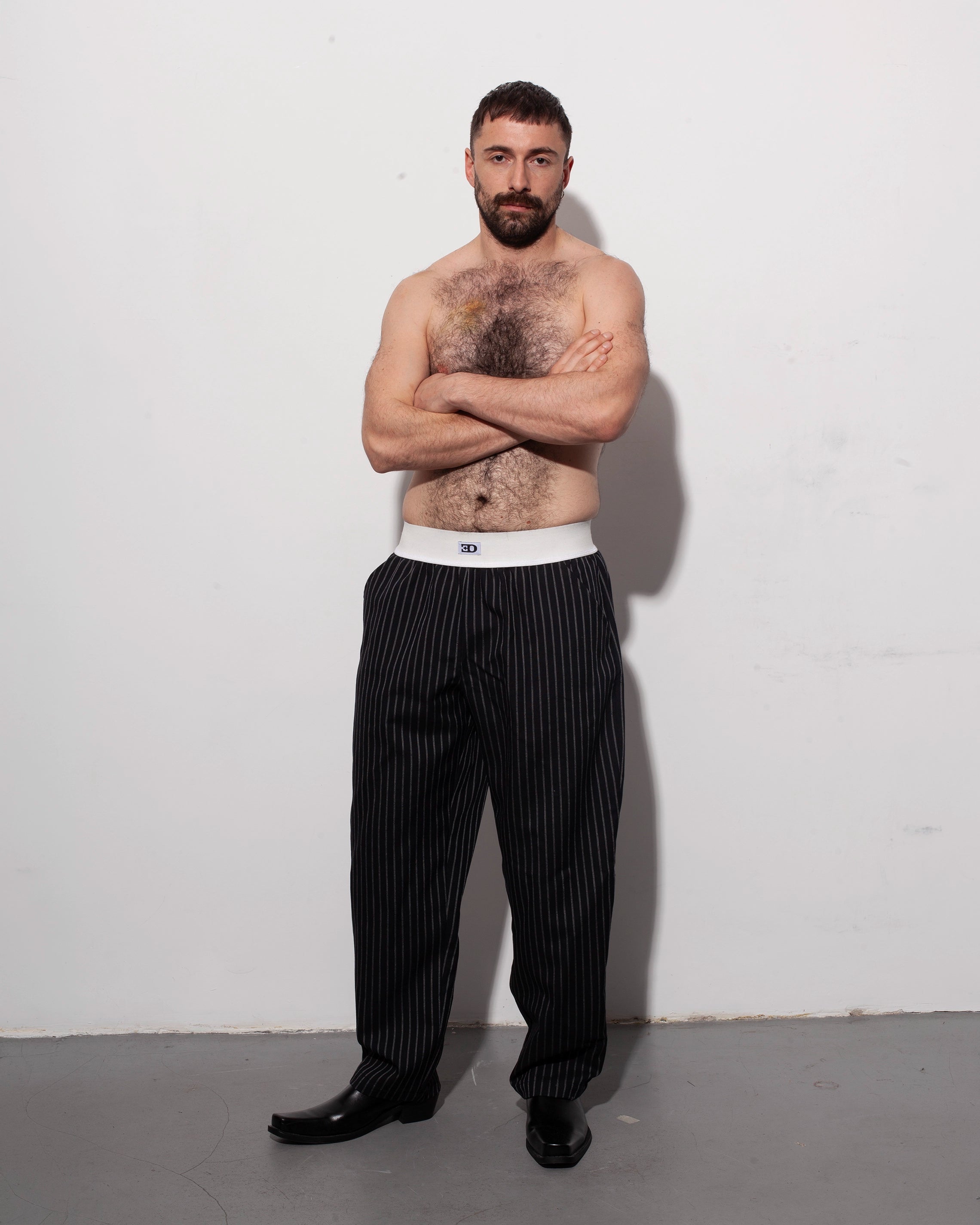 THE BRIEF TROUSERS IN NAVY PINSTRIPE WOOL