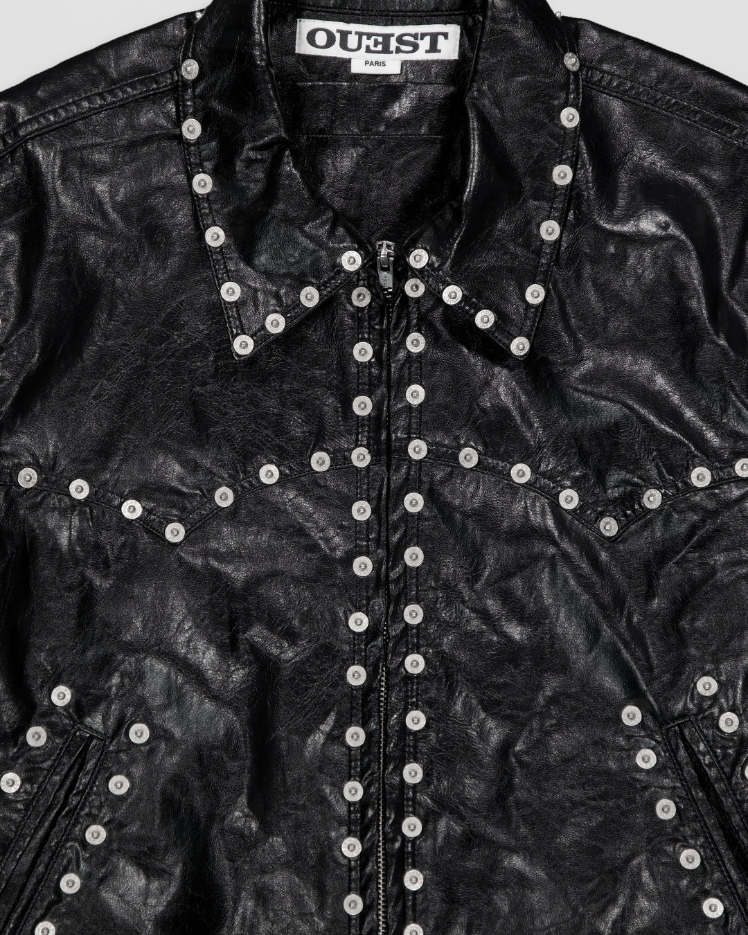 THE ZIPPED STUDDED JACKET IN BLACK FAUX LEATHER
