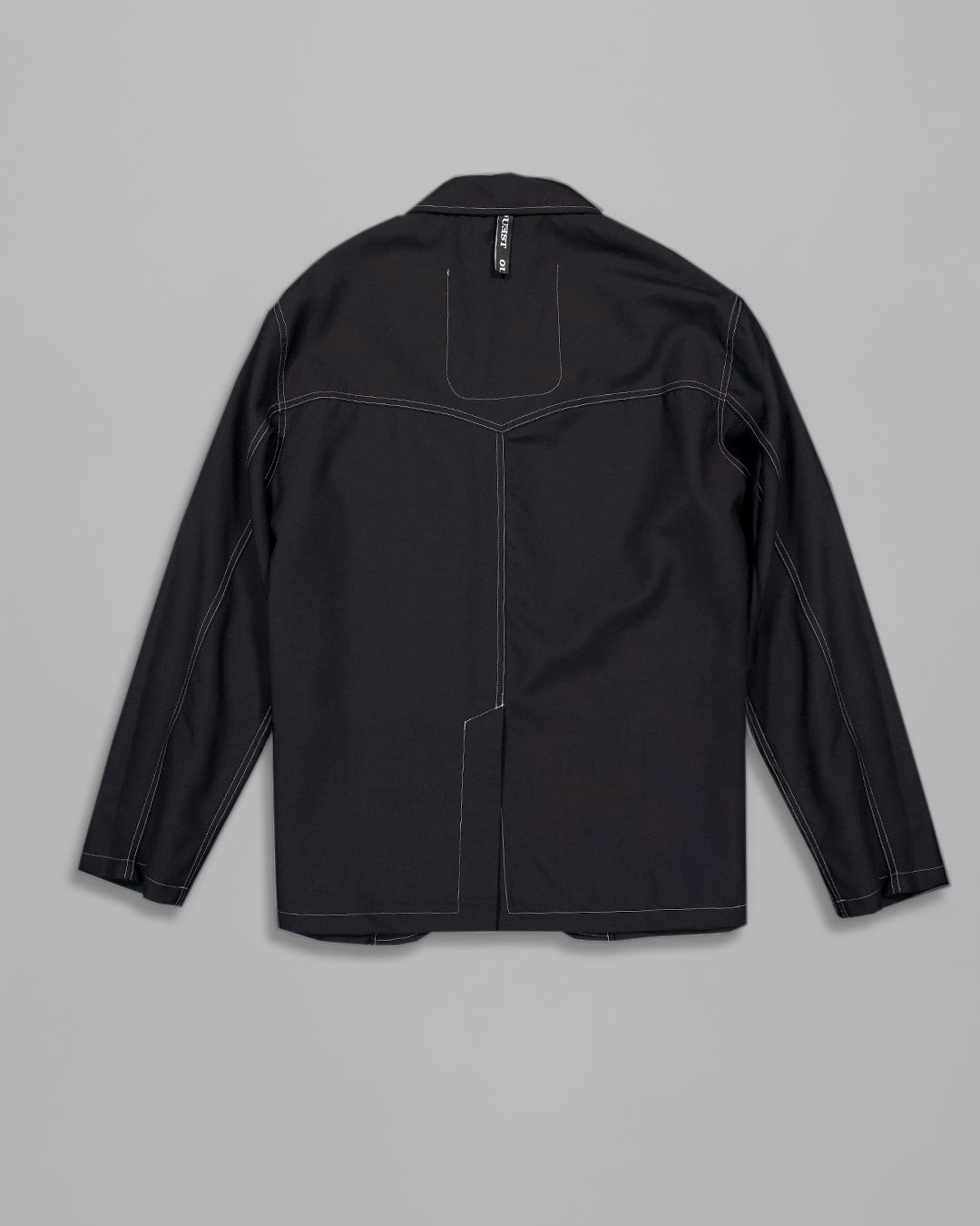 THE UNLINED JACKET IN BLACK WOOL CANVAS
