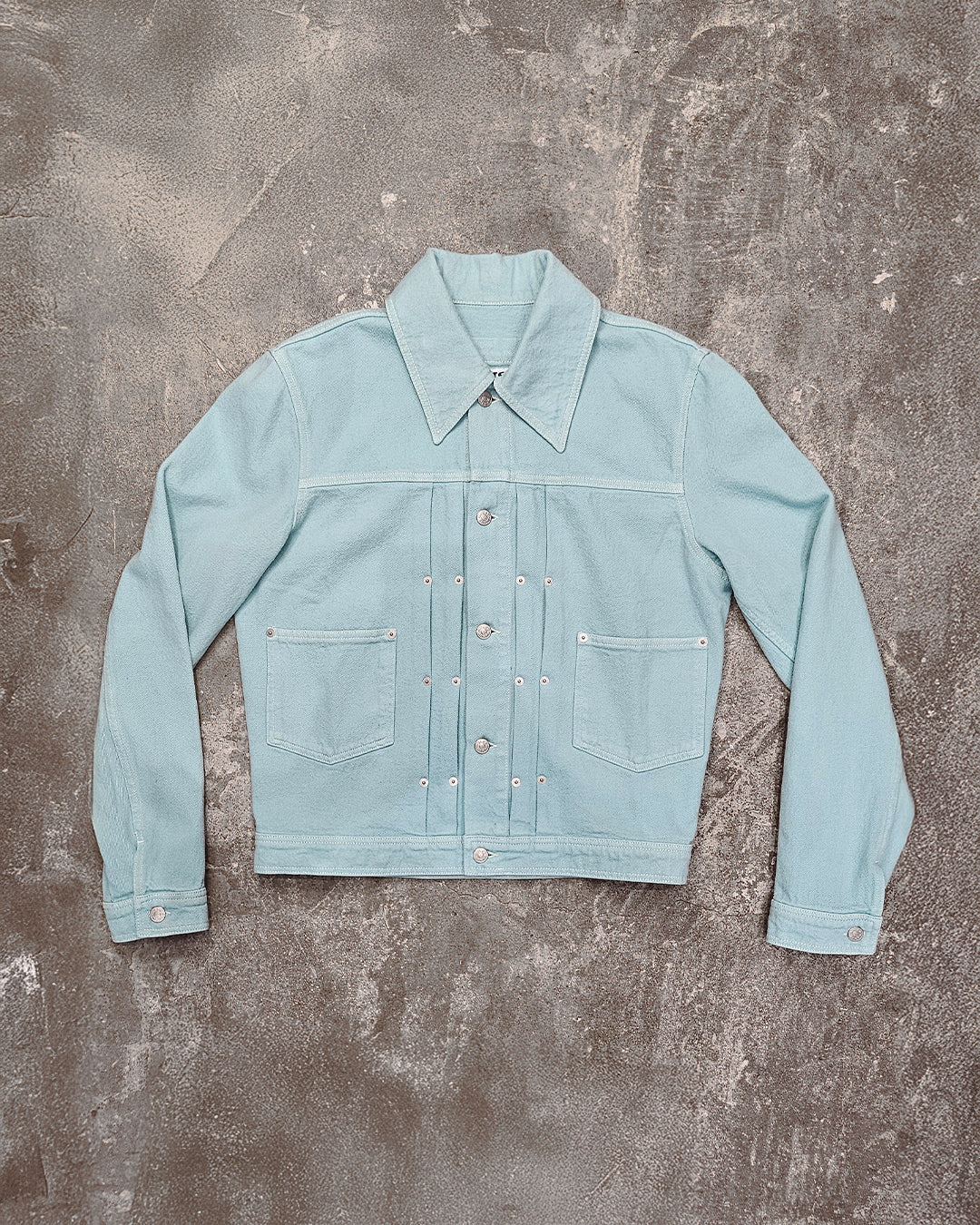 THE TRUCKER JACKET IN OVERDYED TURQUOISE DENIM