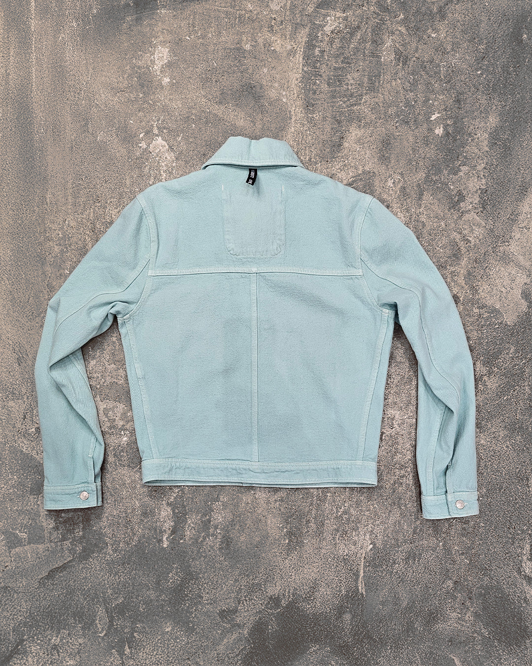 THE TRUCKER JACKET IN TURQUOISE DENIM