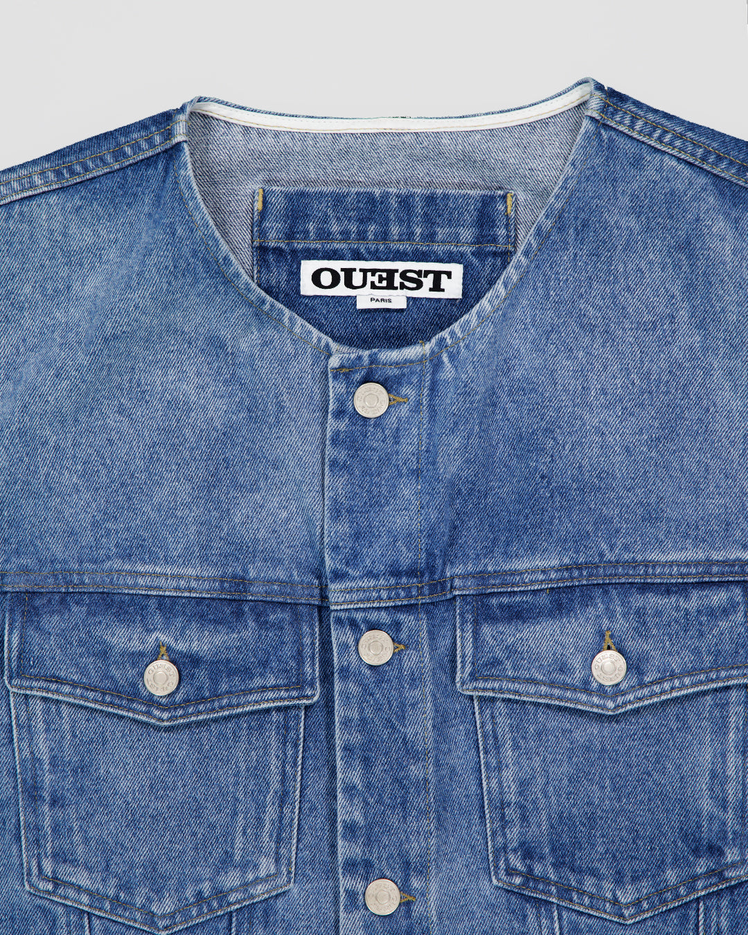 THE SLEEVELESS JACKET IN LIGHT FADED INDIGO DENIM